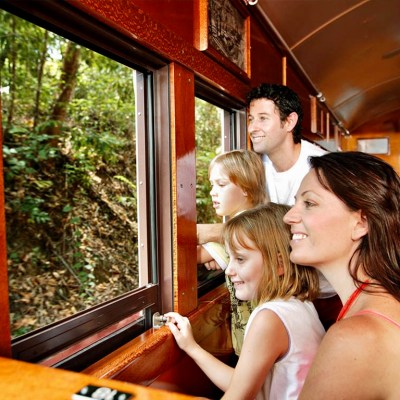 a woman sitting in front of a window